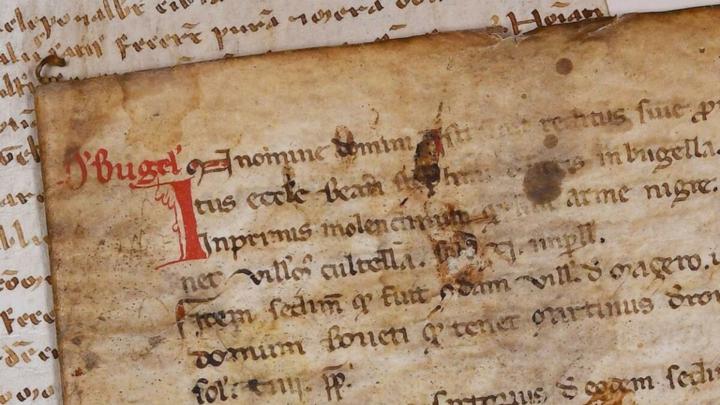 Particolare di documenti medievali manoscritti con attestazione di Bugella, antica Biella