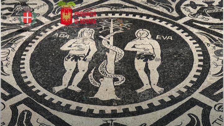 Particolare di immagine dal profilo Facebook del Fai Novara Foto con particolare del mosaico pavimentale romanico raffigurante Adamo ed Eva nella Cattedrale di Novara; due stemmi
